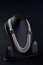 Midnight Bloom Multi-Strand Freshwater Pearl Broach Set with Deep Blue Floral Motifs and Matching Earrings