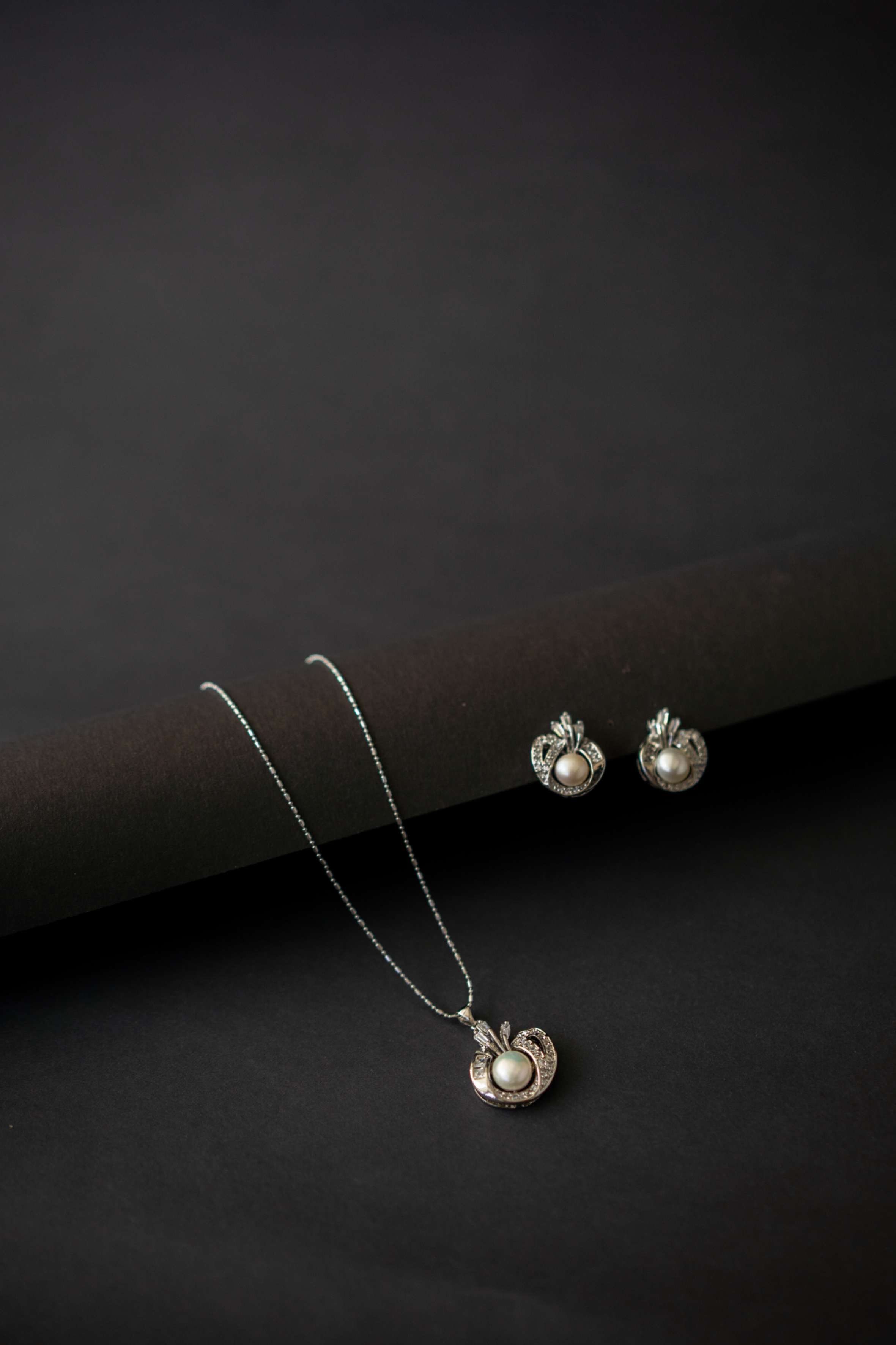 Regal Pearl Embrace 925 Silver jewellery set with freshwater pearl pendant and matching earrings for women