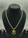 One line freshwater pearl necklace and earrings set with trio-of-pearls pendant and golden filigree design
