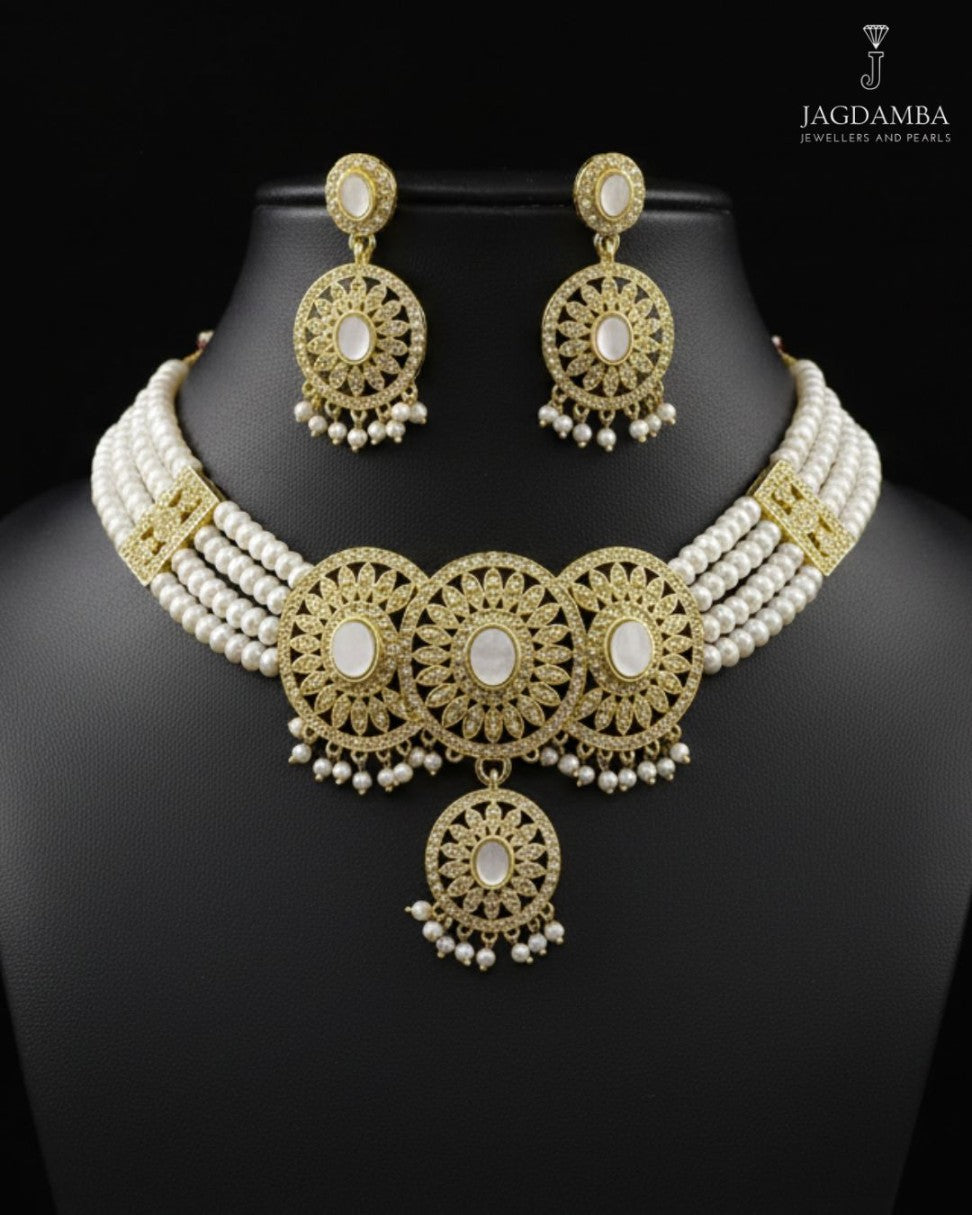 gold toned pearl choker with iridescent medallions and matching earrings for traditional bridal wear
