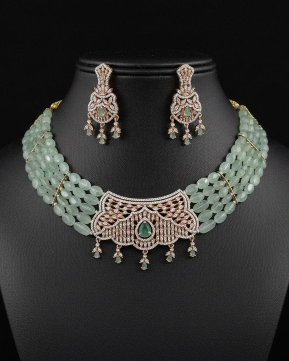 pale green multi-strand beaded choker set with white and light green CZ pendant and matching earrings