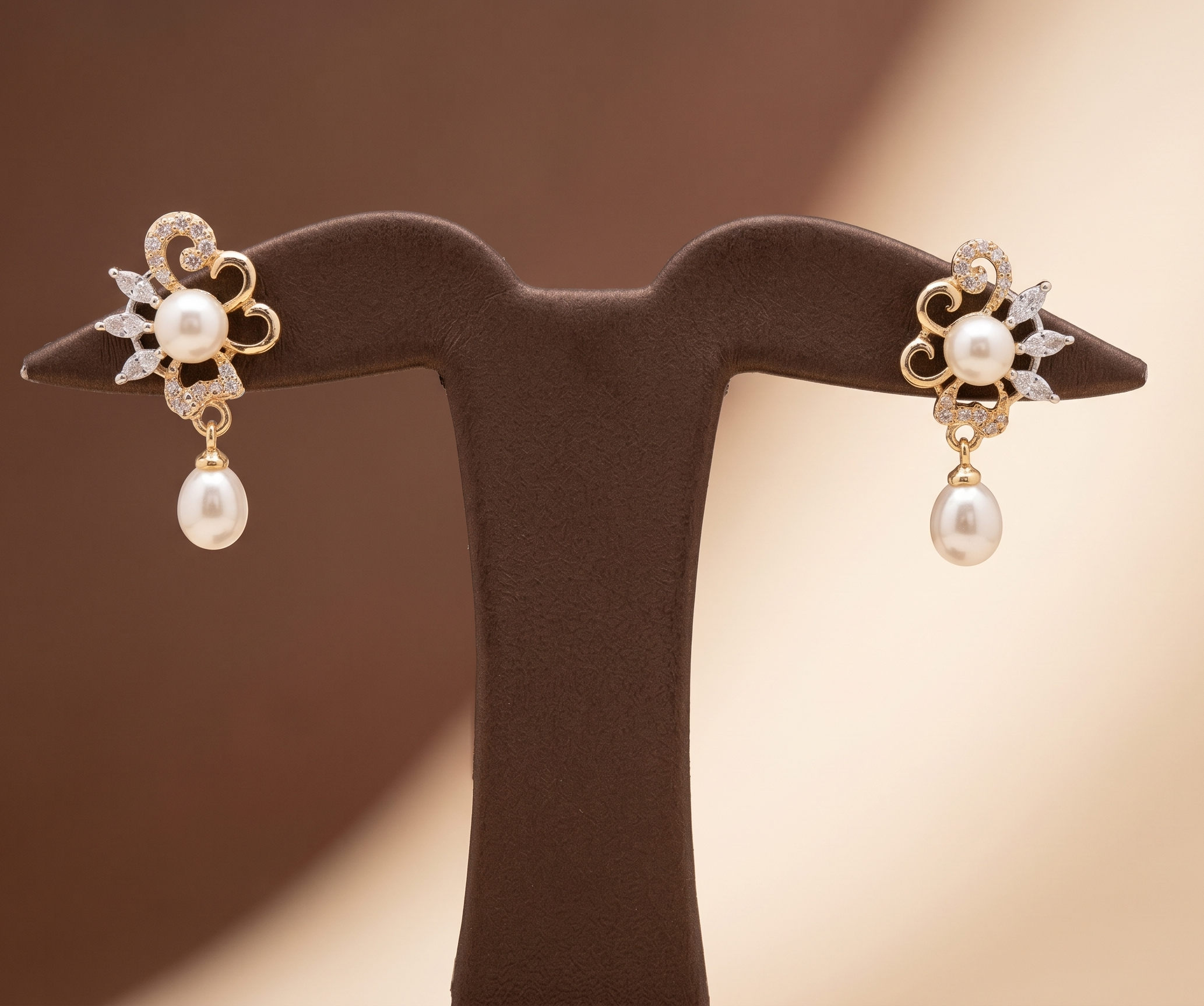 Ornate gold pearl drop earrings for women