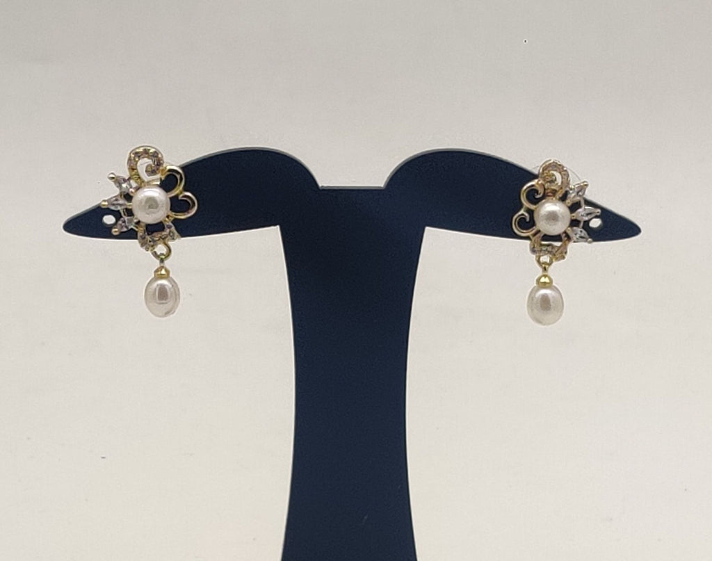 Ornate gold pearl drop earrings for women