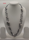 Pearl Cascade freshwater pearl necklace set with silver grey pearls on layered black cords