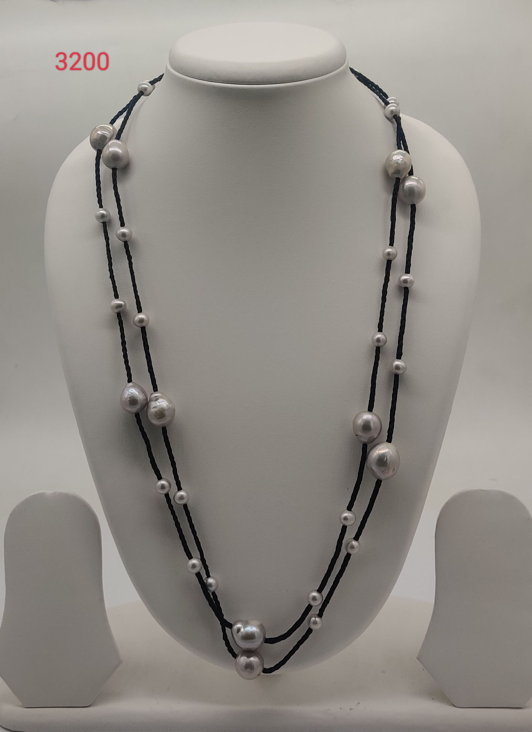 Pearl Cascade freshwater pearl necklace set with silver grey pearls on layered black cords