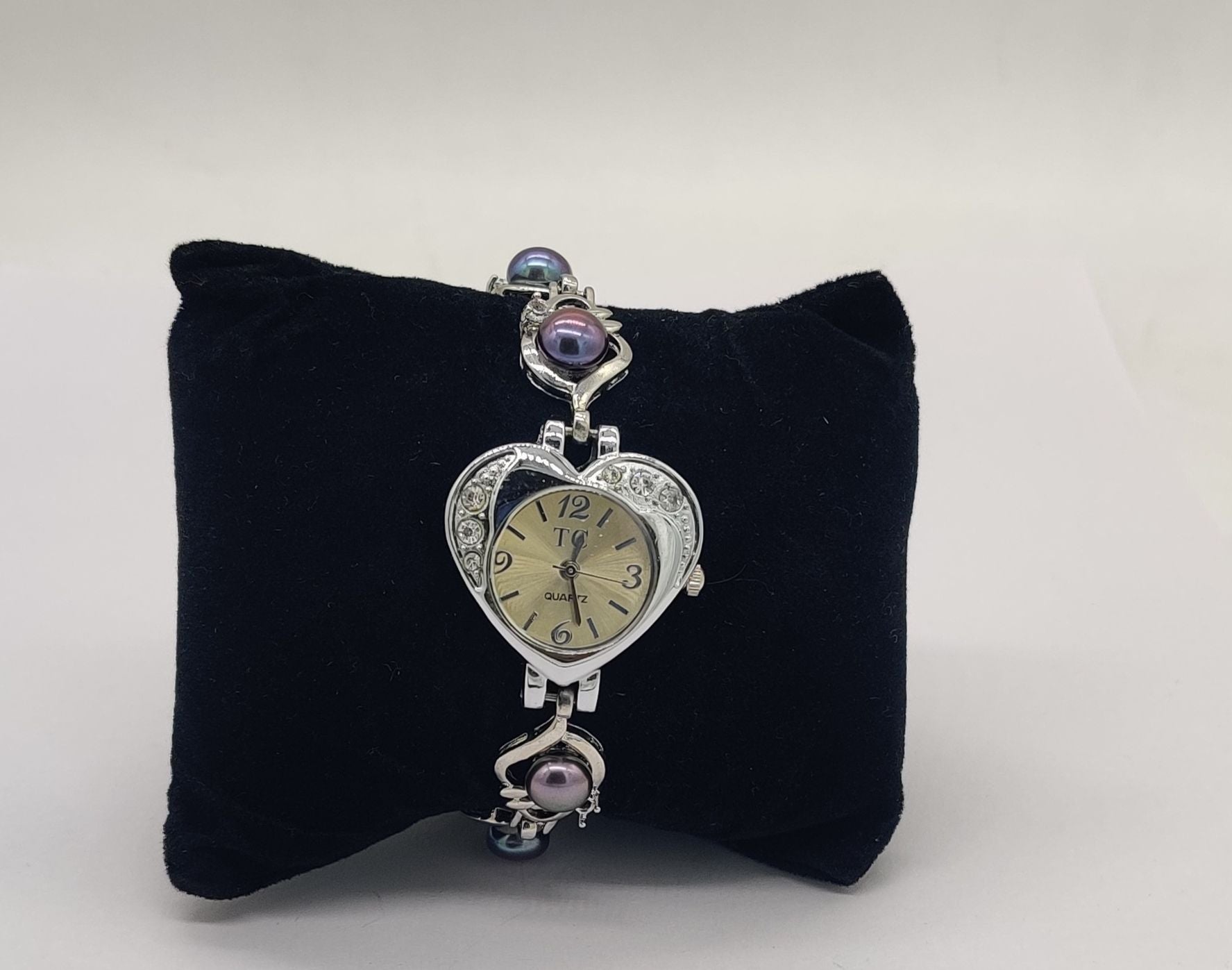 pearl bracelet heart dial watch for women with crystal detailing