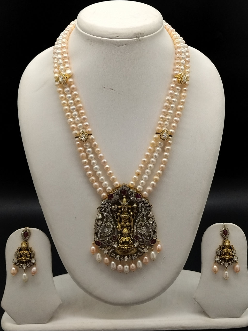 Pink and white freshwater pearl pendant necklace set with temple design antique gold pendant and layered pearls