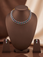 Pink, green and white American Diamond necklace set with matching drop earrings and rhodium finish.