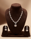 Pink pearl necklace set with white stones and matching earrings for women