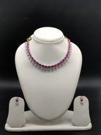Rani pink and white American Diamond necklace set with floral design and matching drop earrings.