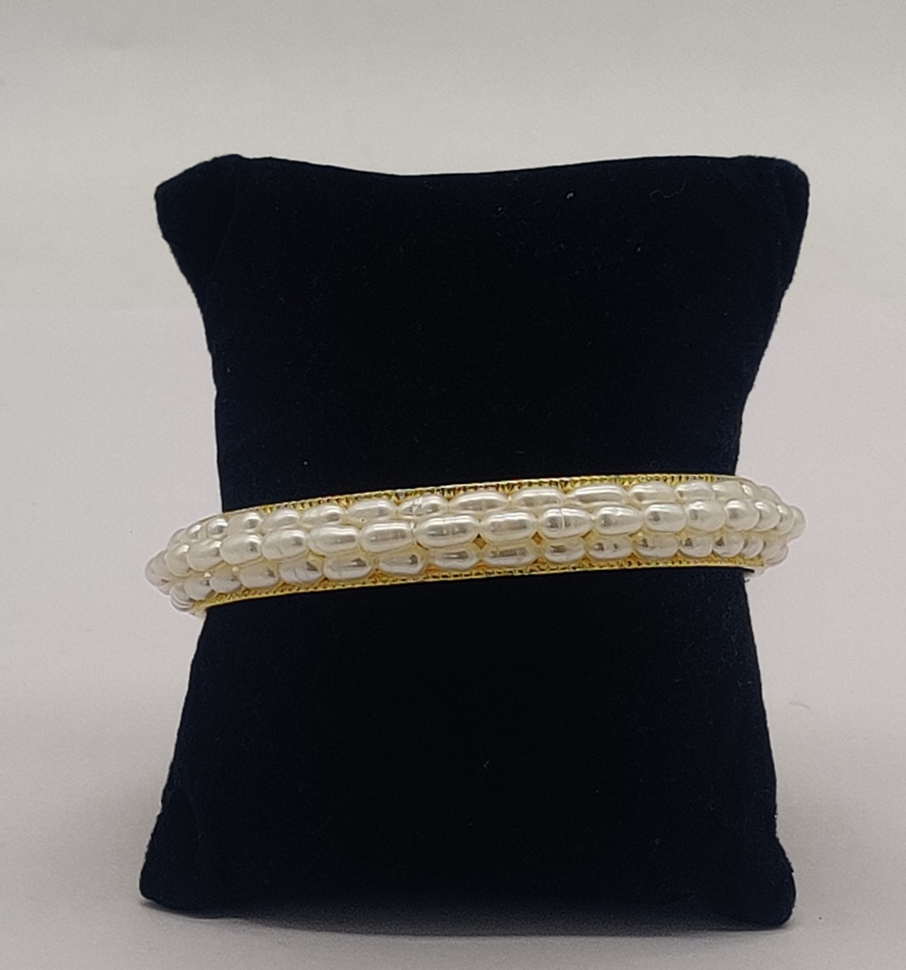 Rigid gold bangle with white freshwater pearls elegant minimalist pearl bracelet
