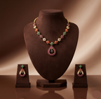 Royal Navratna CZ necklace set with multicolour stones and matching drop earrings.