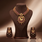 Royal Red CZ peacock necklace set with matte gold finish and matching peacock earrings.