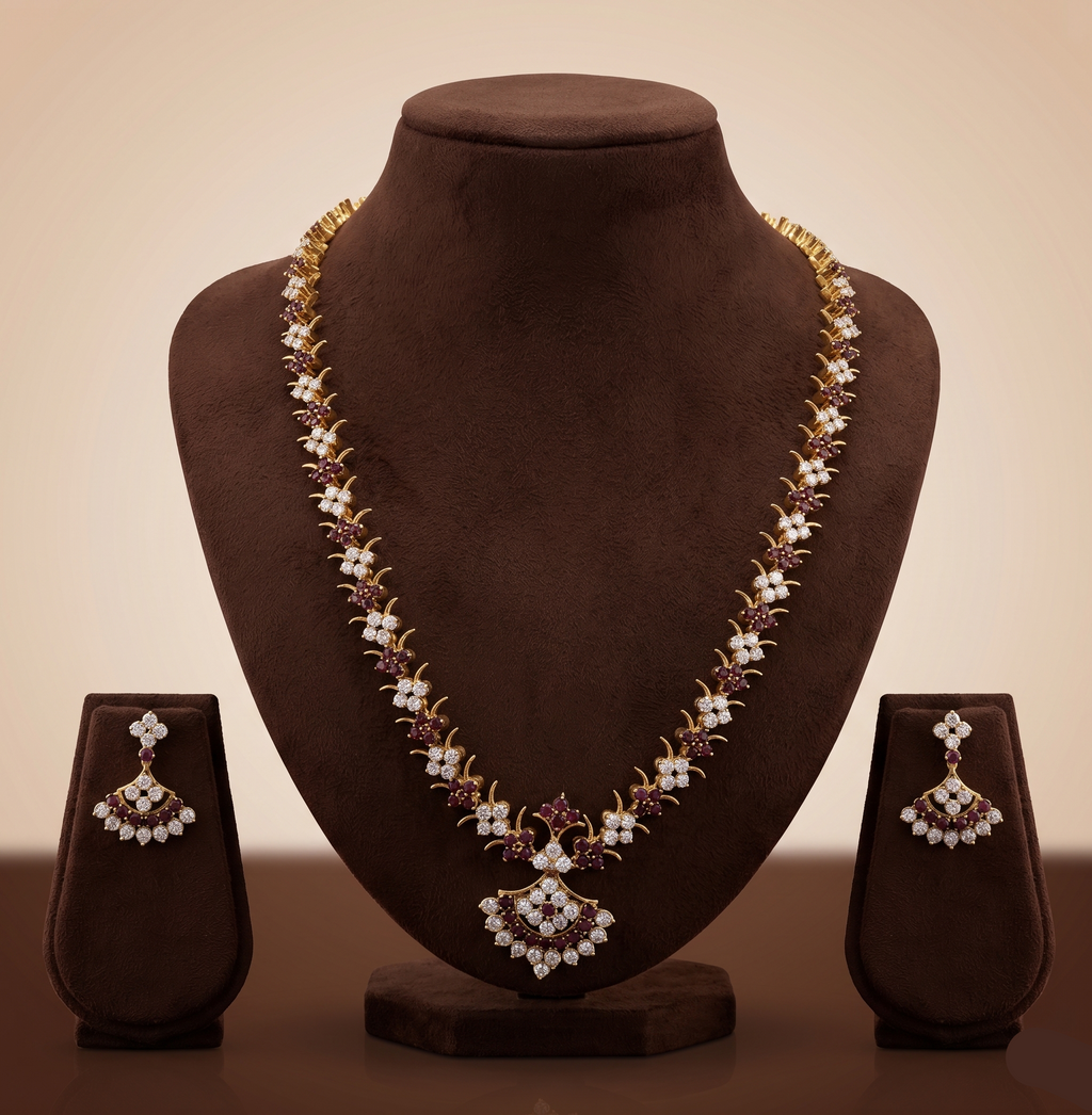 Royal White Brown CZ long necklace set with polished gold finish and matching drop earrings.