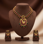 Royal multicolour CZ peacock necklace set with gold-tone finish and matching drop earrings.