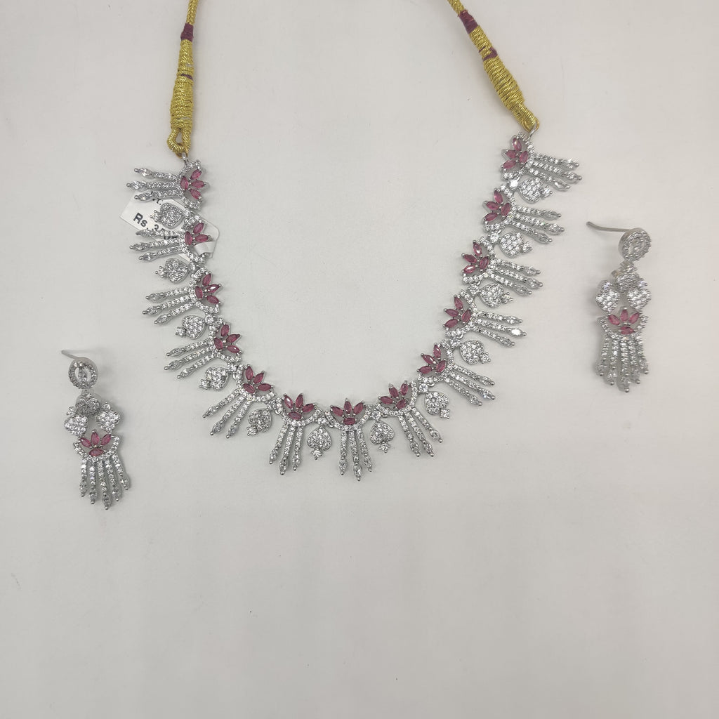 Royal white and pink CZ floral fringe necklace set with matching rhodium-plated earrings.