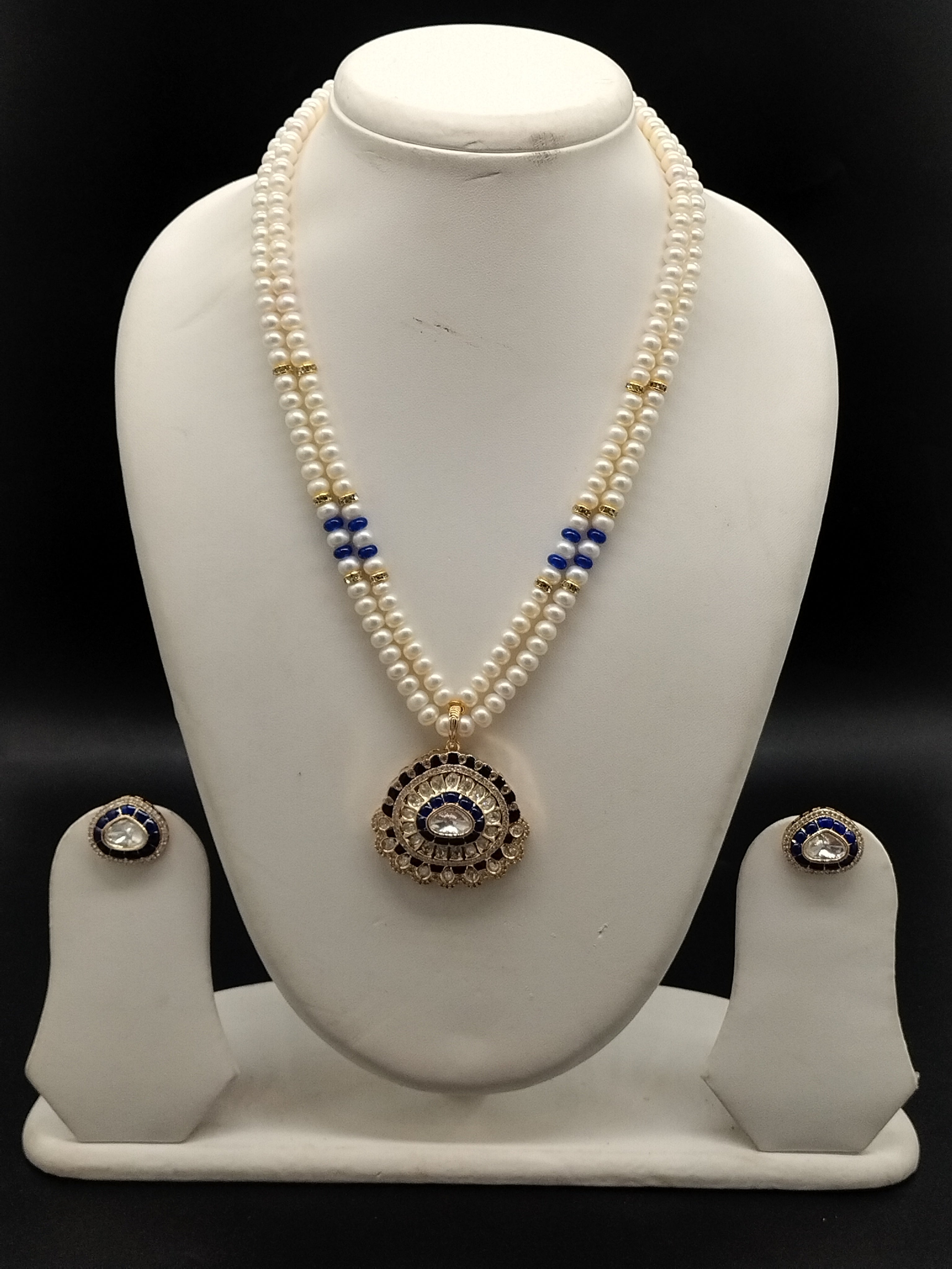 Sapphire Glow freshwater pearl pendant necklace set with two line white pearls and blue stone pendant