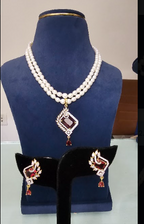 The Ruby Rhombus: 2-Line Oval Pearl & Garnet-Red Stone Necklace Set