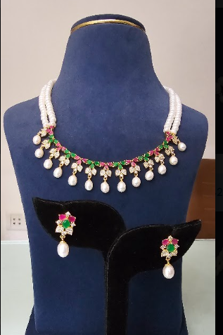 The Navratna Garland: 2-Line Pearl Necklace with Ruby & Emerald Festoon Set