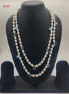 Serene Bloom freshwater pearl necklace with irregular white pearls and light blue beads in two strand design