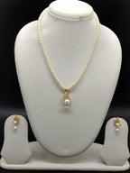 Snow Grace freshwater pearl pendant necklace set with white flat pearls and minimal gold pendant with pearl drop