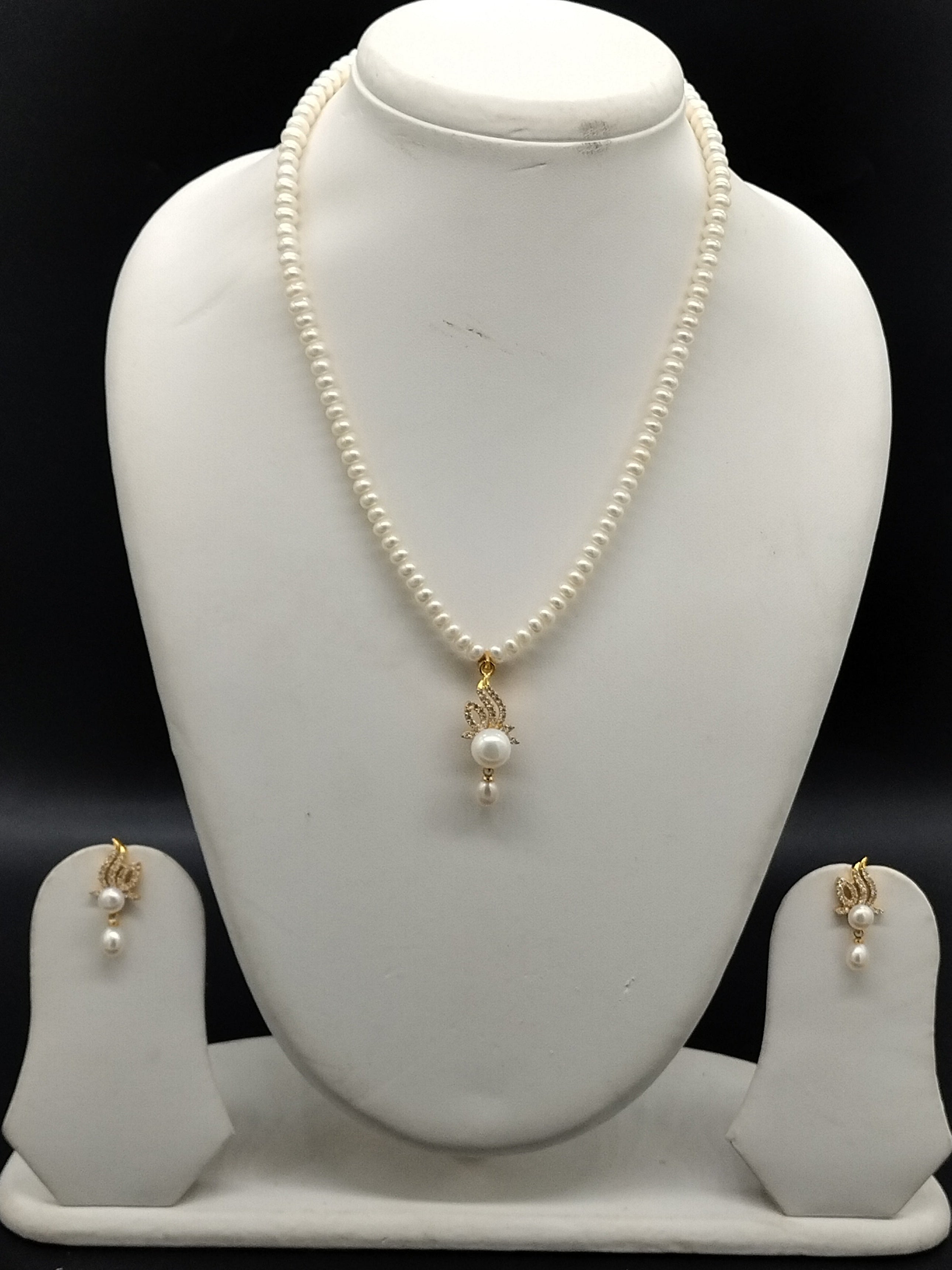 Snow Grace freshwater pearl pendant necklace set with white flat pearls and minimal gold pendant with pearl drop