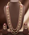 Three-line freshwater pearl long haram set with red and white stone detailing and matching statement earrings.