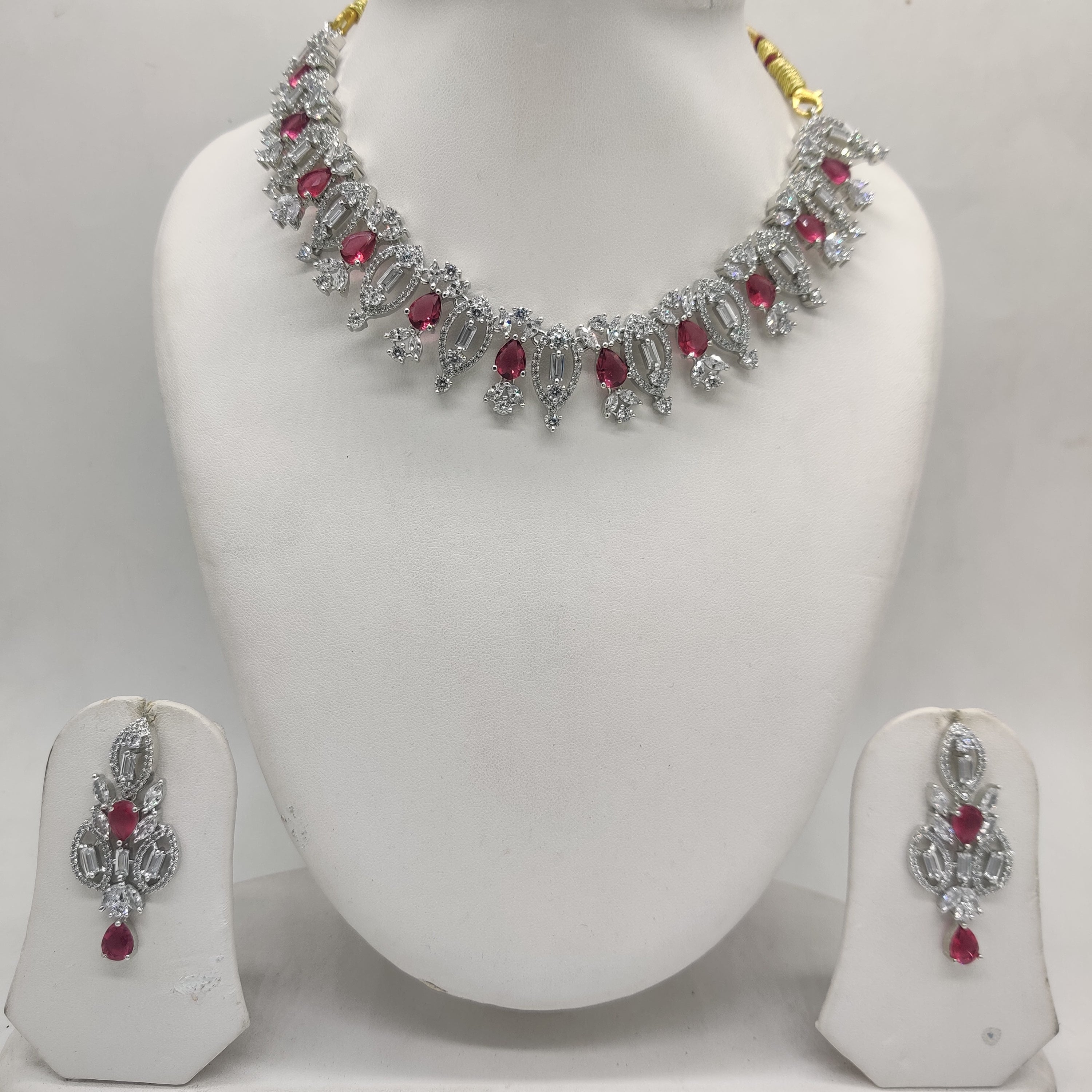 White and pink American Diamond necklace set with matching floral-inspired drop earrings