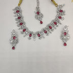 White and pink American Diamond necklace set with matching floral-inspired drop earrings