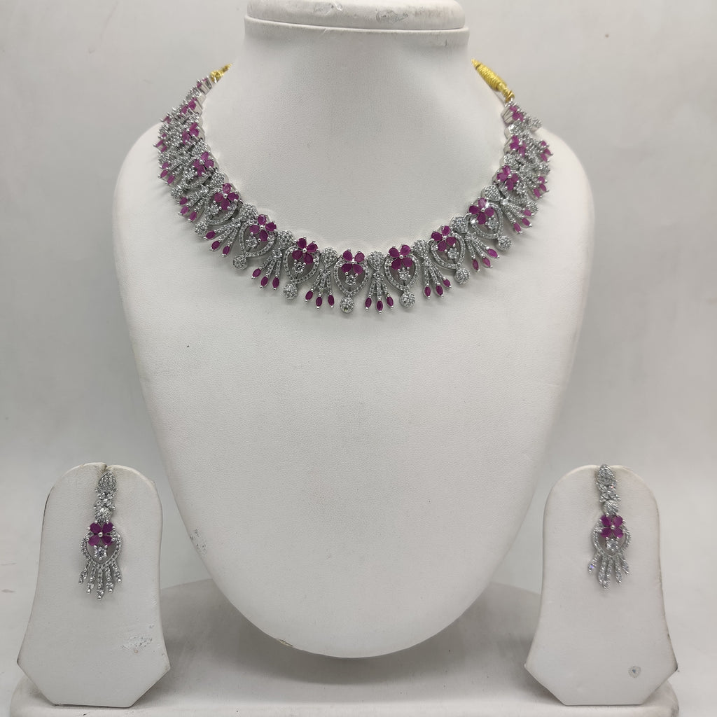 White and red American Diamond floral necklace set with matching drop earrings.