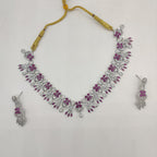 White and red American Diamond floral necklace set with matching drop earrings.