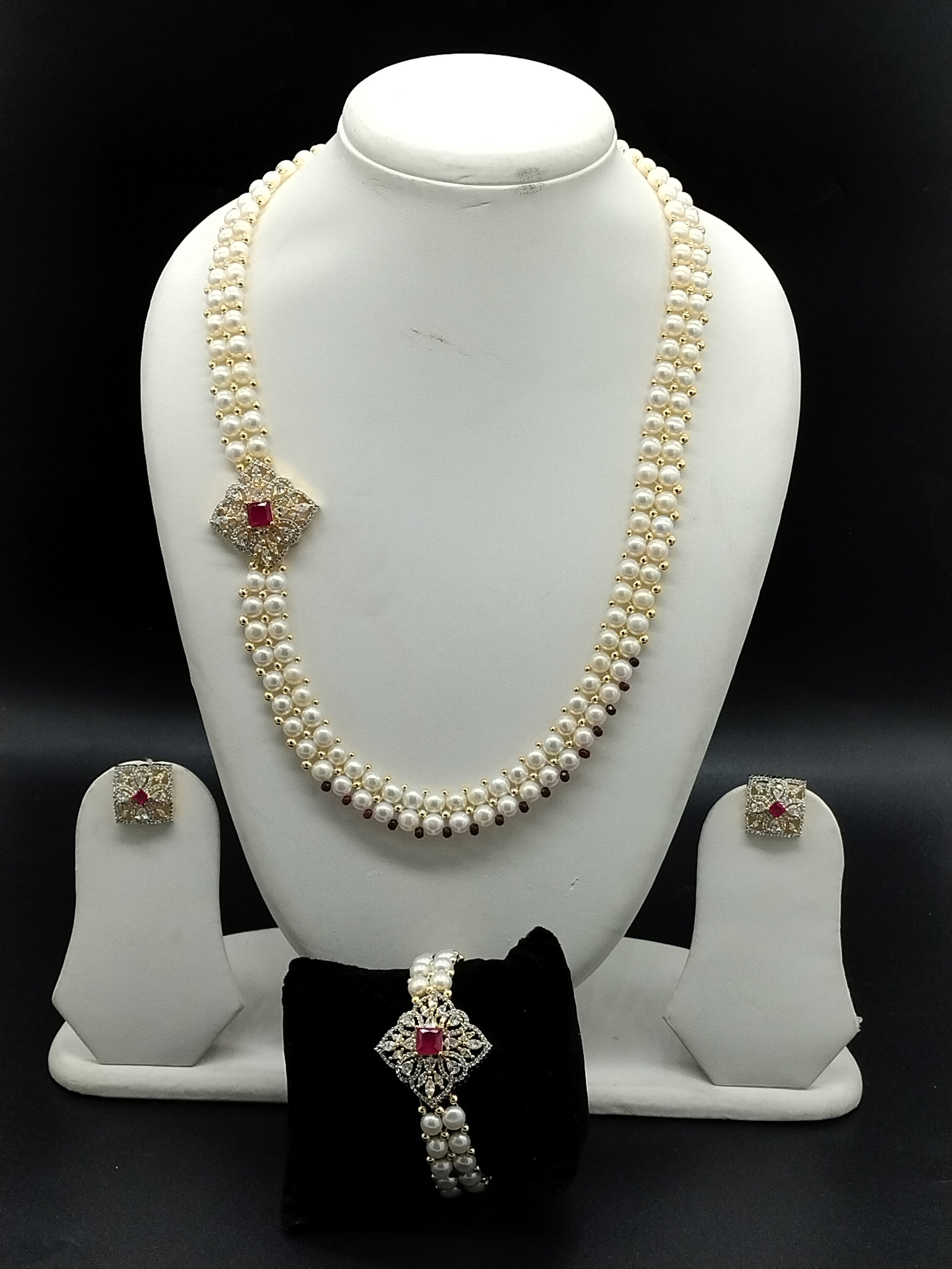 White freshwater pearl side brooch necklace set with red floral stone design and matching earrings