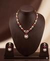 White freshwater pearl necklace set with red stones and floral pendant for women