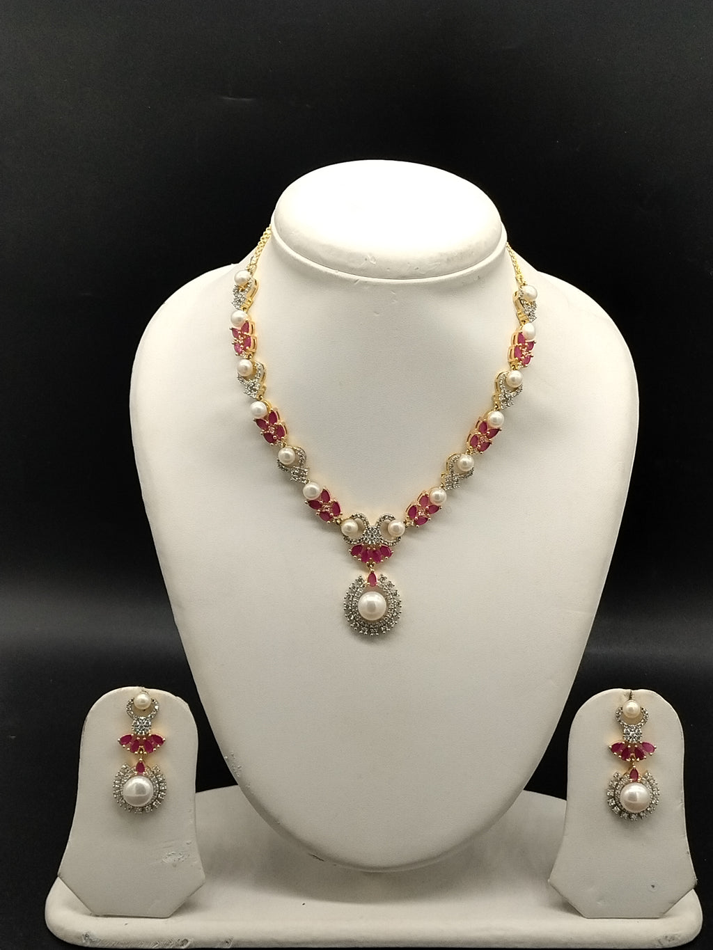 White freshwater pearl necklace set with red stones and floral pendant for women