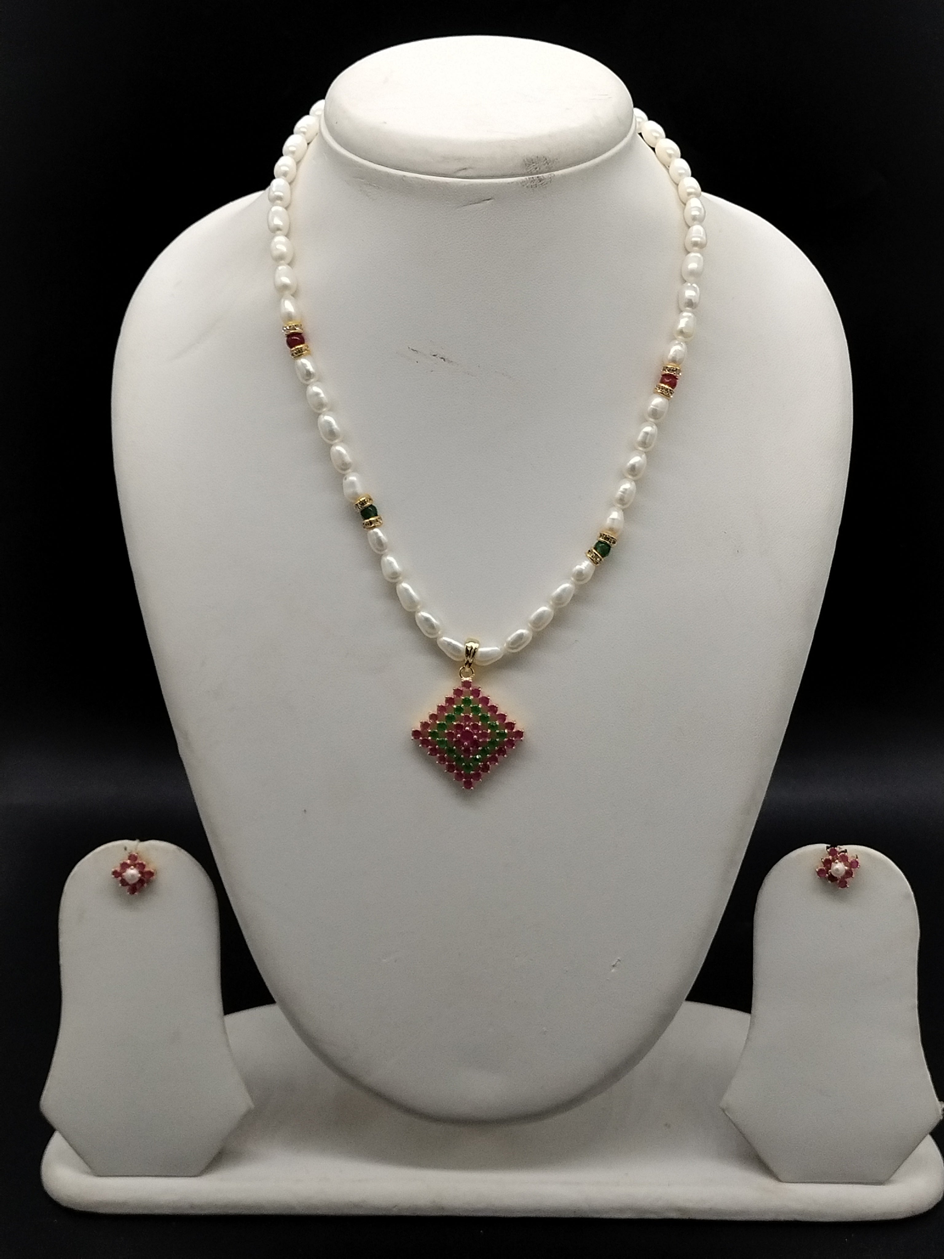 White freshwater pearl pendant necklace set with diagonal square red and green stone pendant