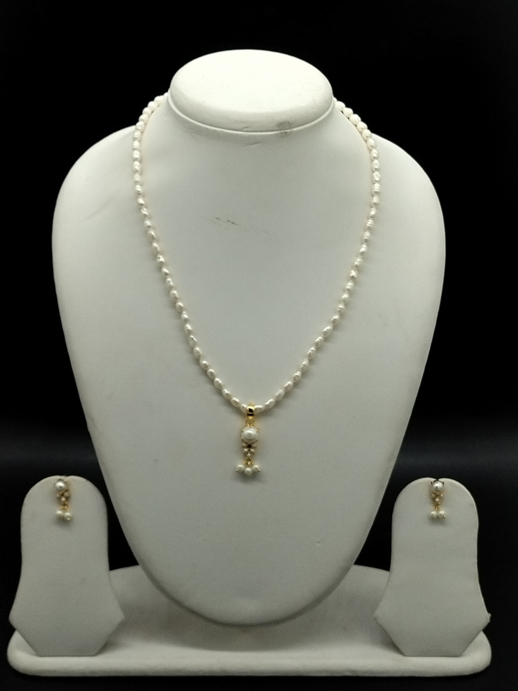 White freshwater pearl pendant necklace set with single pearl drop pendant and oval pearls