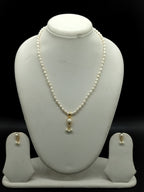 White freshwater pearl pendant necklace set with single pearl drop pendant and oval pearls