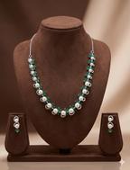White pearl necklace set with green stones and white stones for women