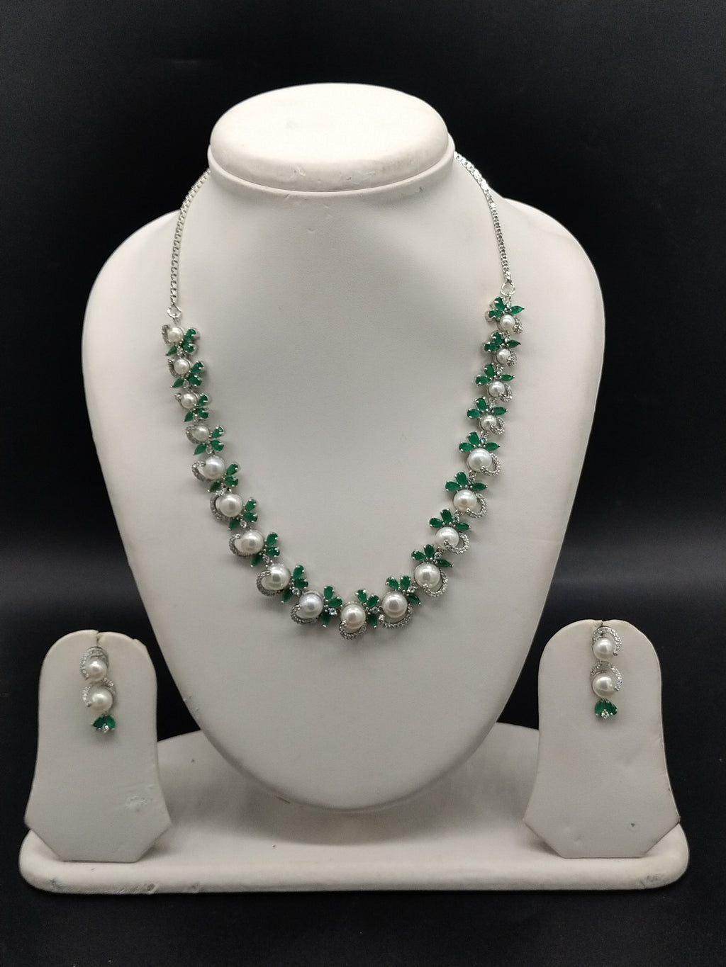 White pearl necklace set with green stones and white stones for women