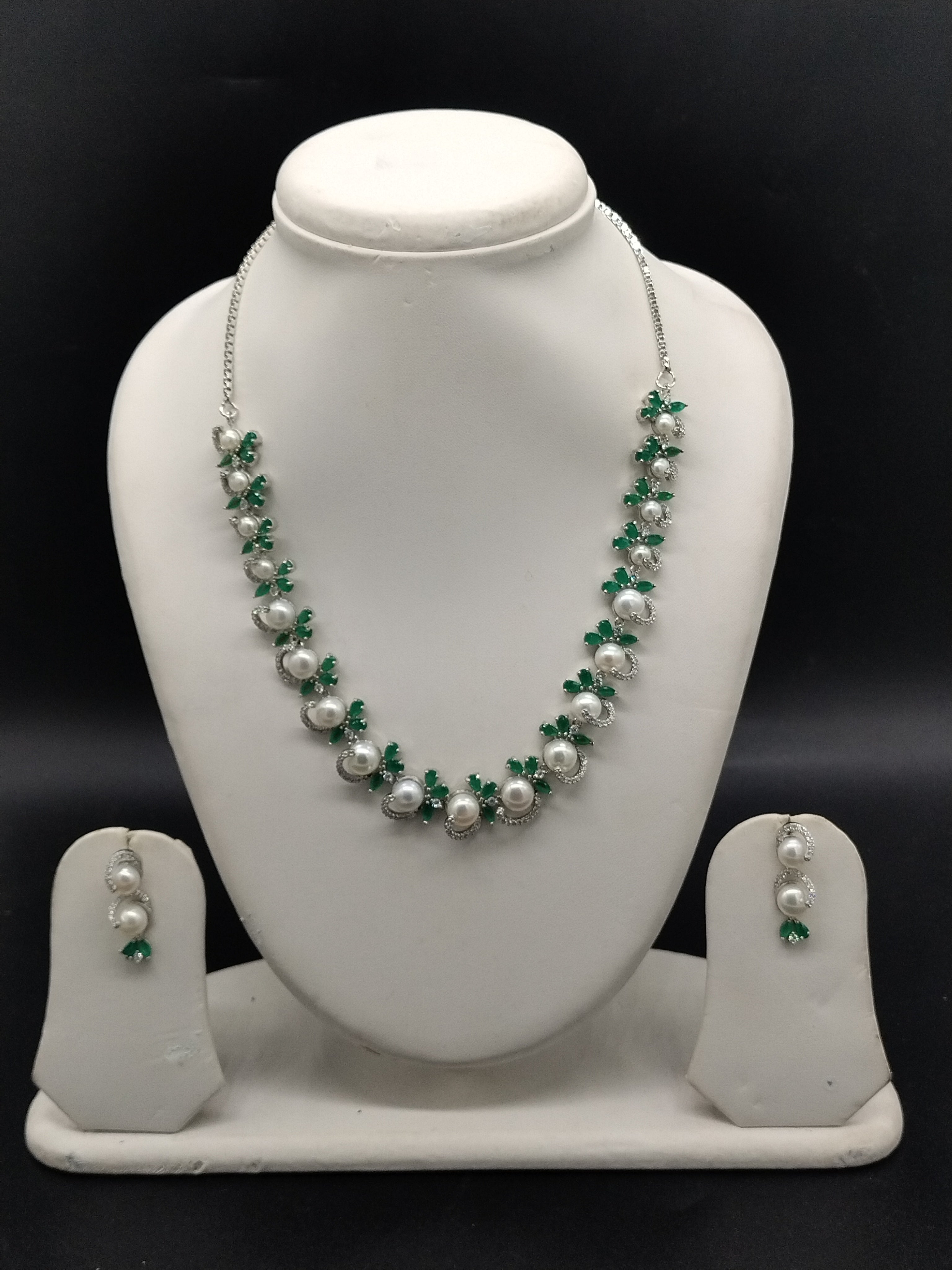 White pearl necklace set with green stones and white stones for women