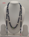black freshwater pearl necklace with multicolor stone accents in layered design