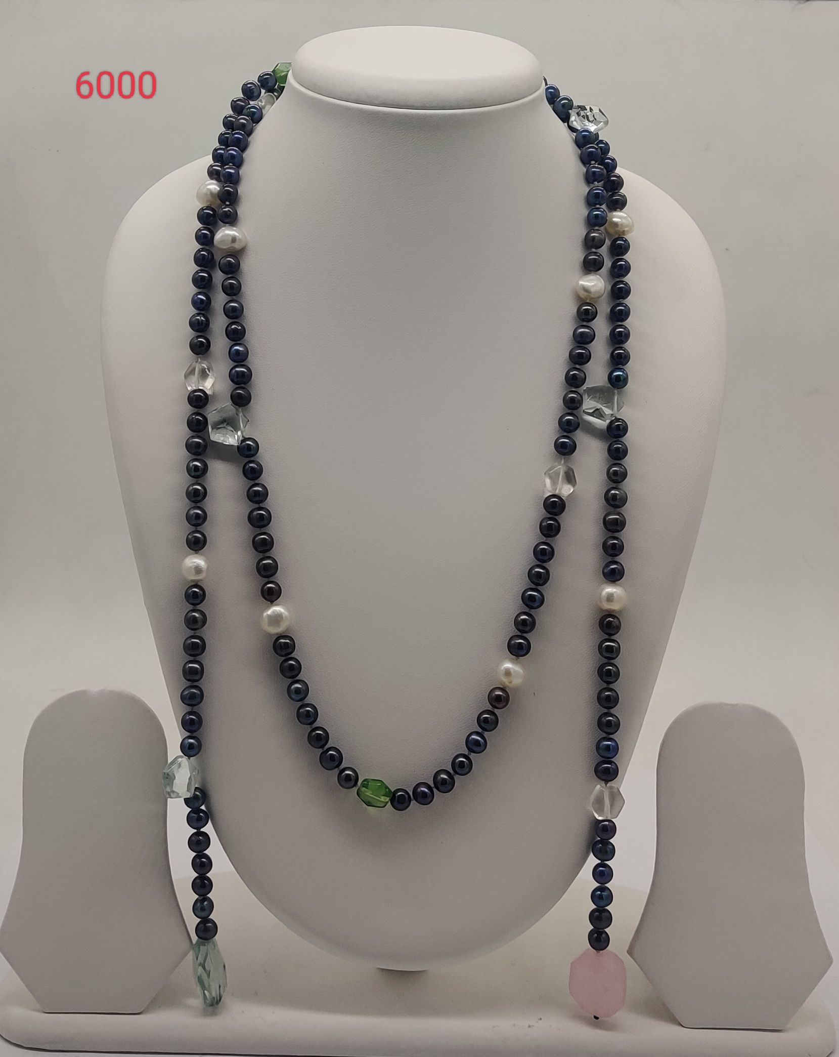 black freshwater pearl necklace with multicolor stone accents in layered design