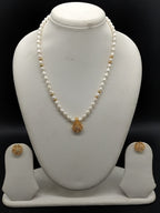 White freshwater pearl one line pendant necklace set with gold pendant and matching earrings