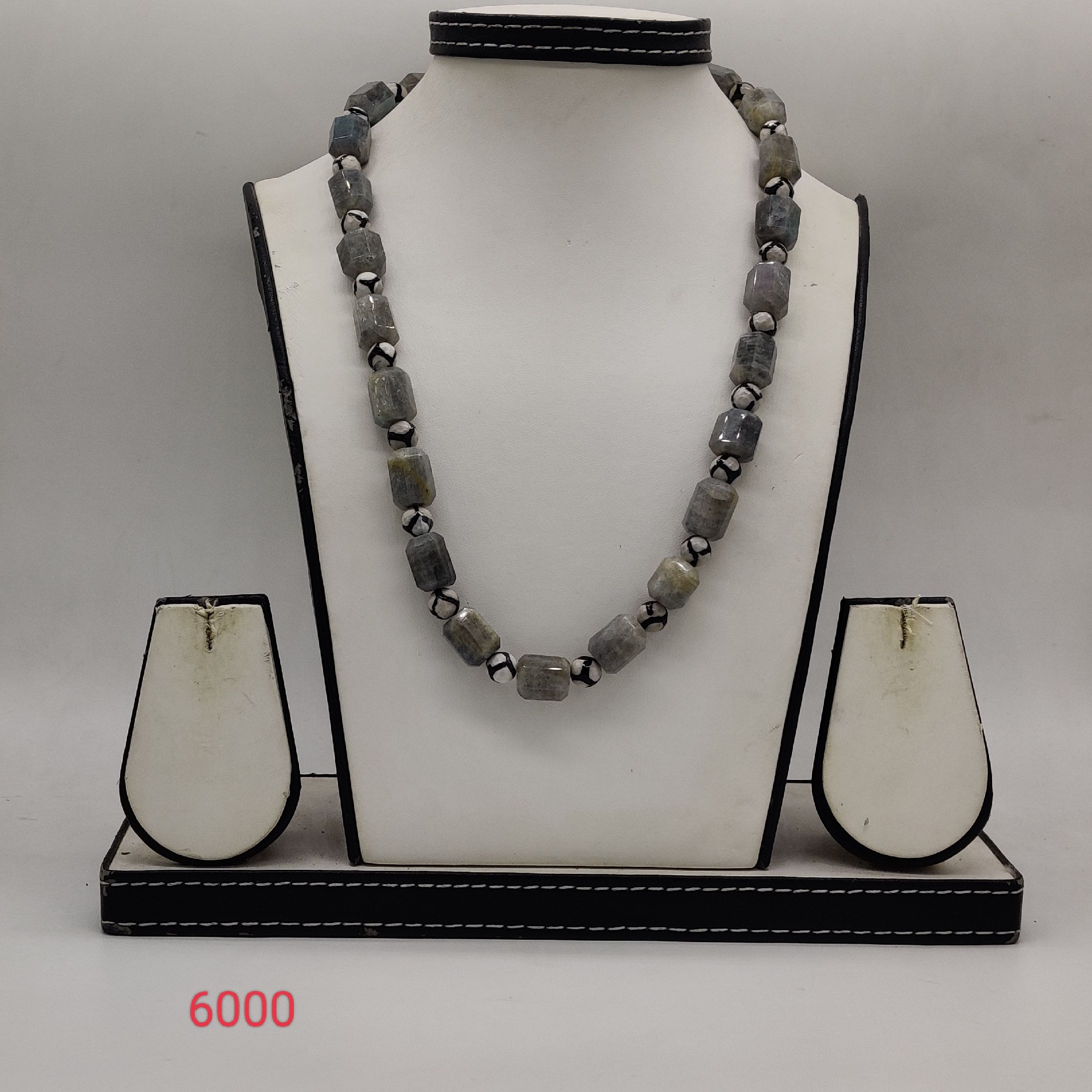 grey stone jewellery set with barrel shaped beads and matching earrings