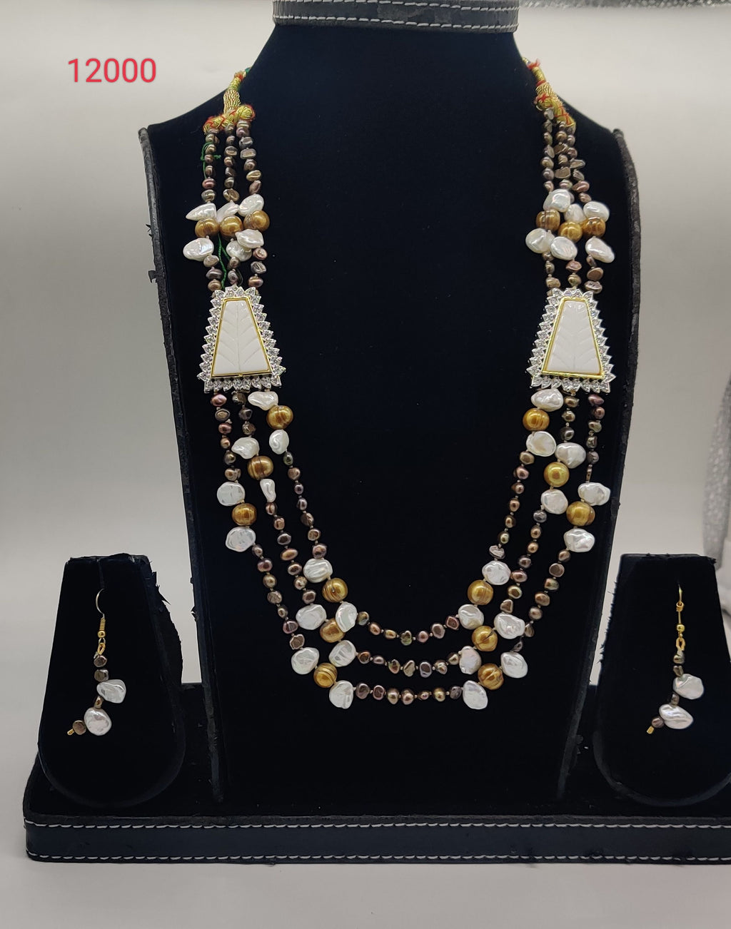 multi color freshwater pearl pendant set with triangular pendants and white stone detailing