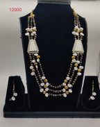 multi color freshwater pearl pendant set with triangular pendants and white stone detailing