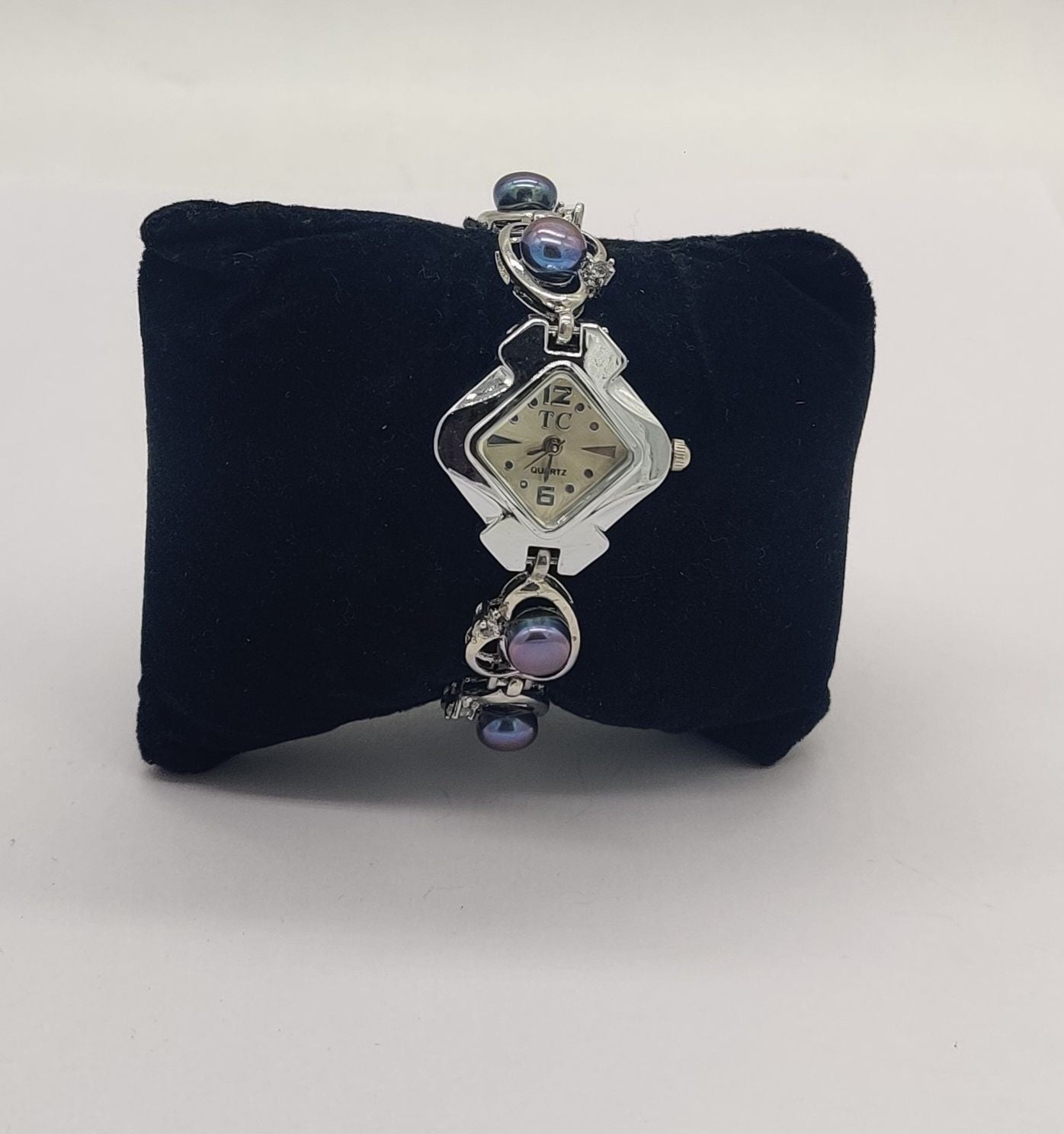 pearl bracelet watch for women with diamond shaped dial