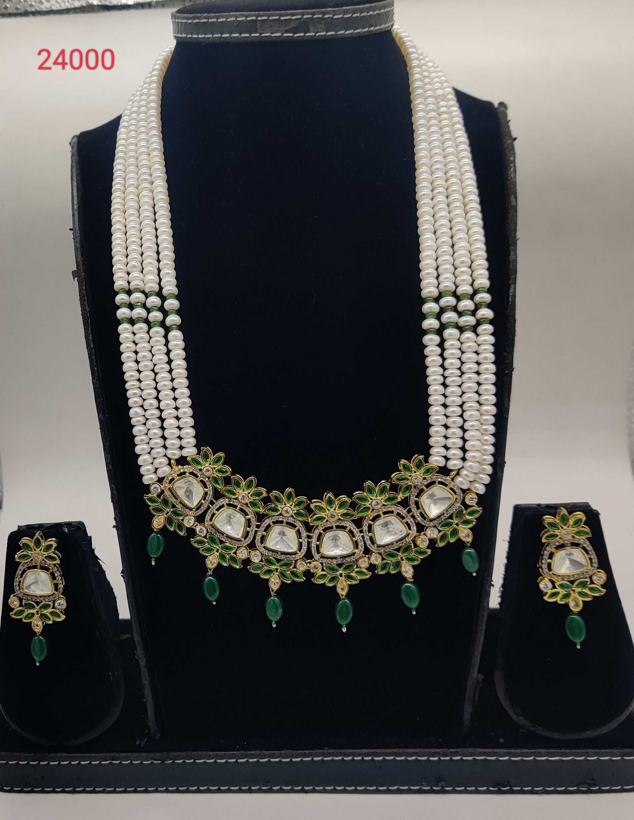 polki freshwater pearl pendant set with green stones and floral design with matching earrings