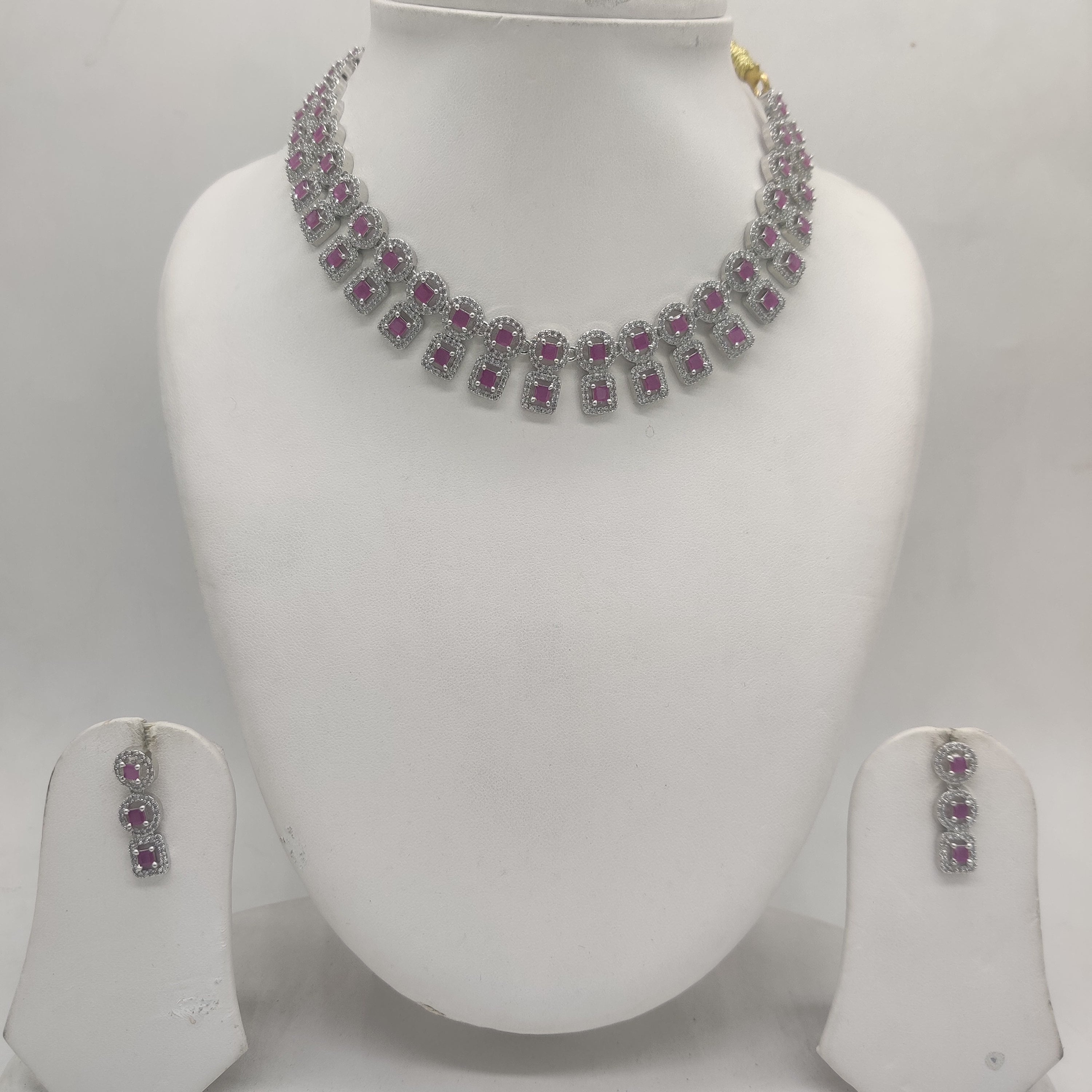 Royal white and red CZ geometric choker necklace set with matching rhodium-plated drop earrings.