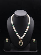 The Emerald Tear: 2-Line Flat Pearl Necklace with Green Stone Pendant Set
